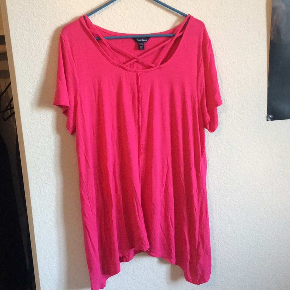 Hot pink top with a crisscross neckline